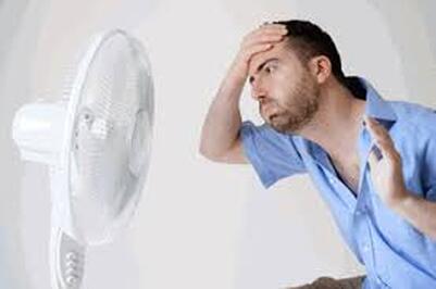 Man hot needs Air Conditioner repair 