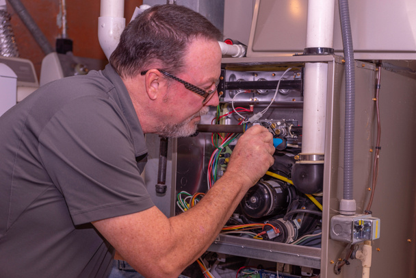 Furnace repair technician Troy MI
